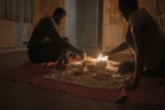 couple having a picnic on the floor