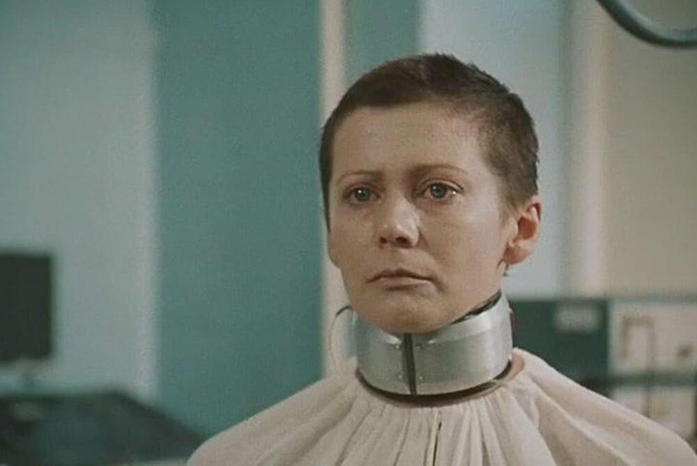 woman in metal collar