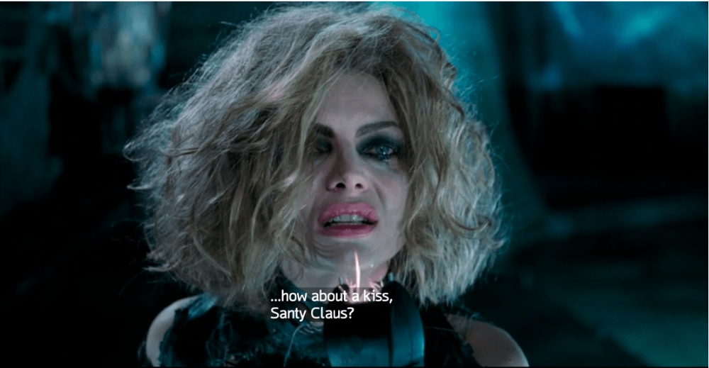 a disheveled woman with a flame