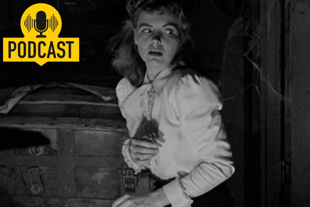 a black and white photo of a woman looking scared.