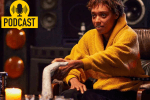 A teenager in a yellow robe holds a petrified hand.